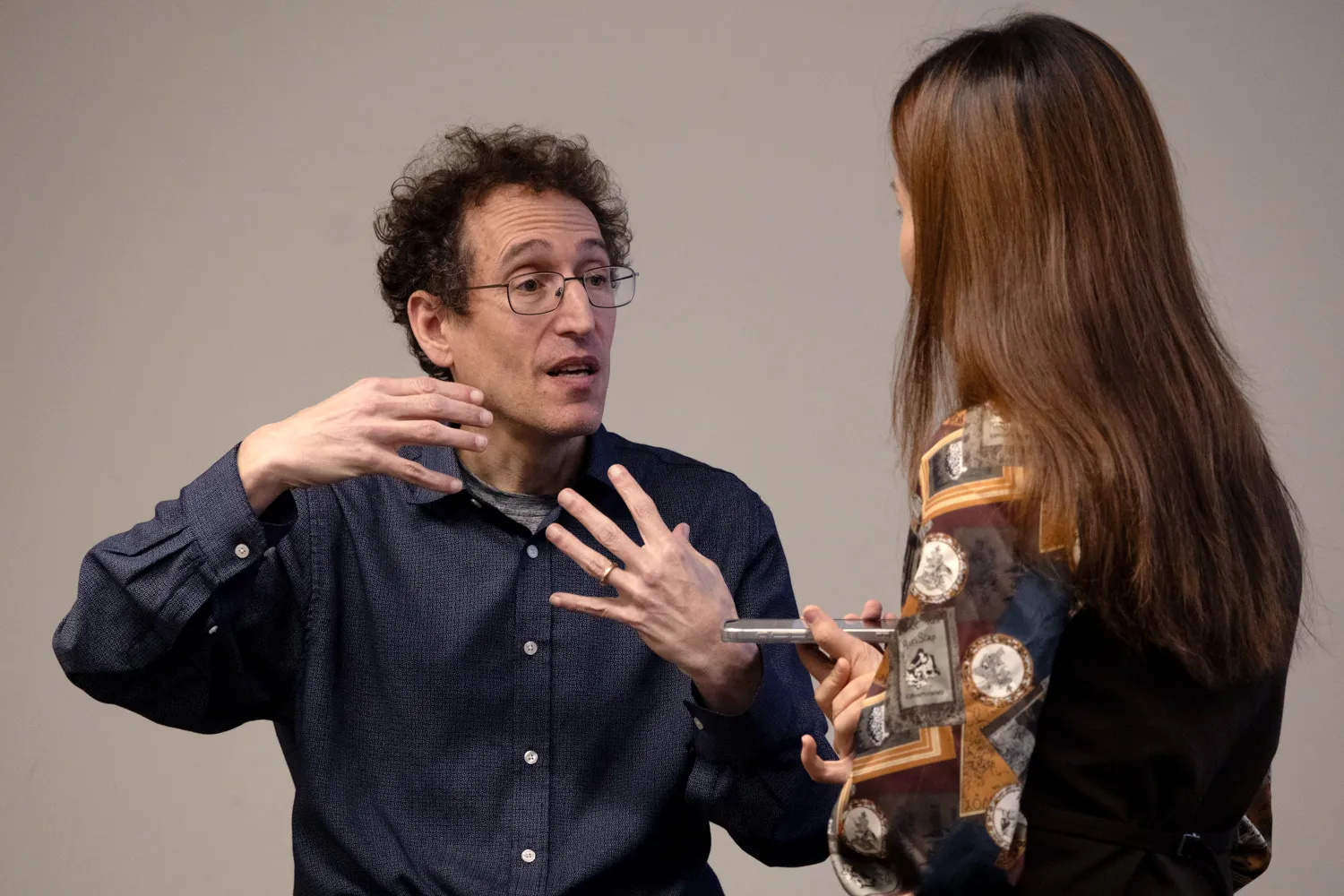 A woman speaks with Jamie Druckman